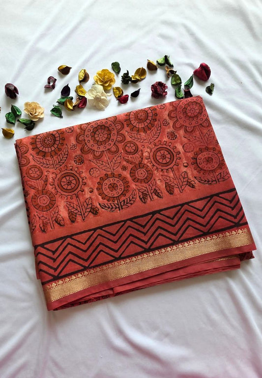 Brick red Ajrakh hand blockprinted Maheswari silk saree