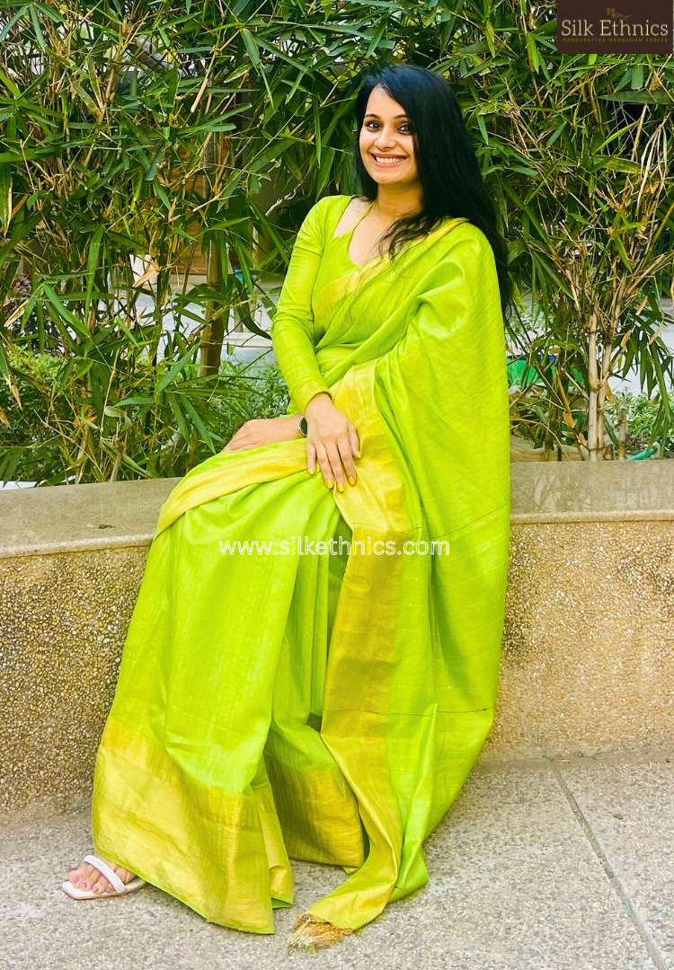 Temple border green raw silk saree