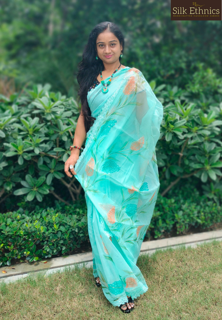 Handpainted turquoise Blue soft organza saree