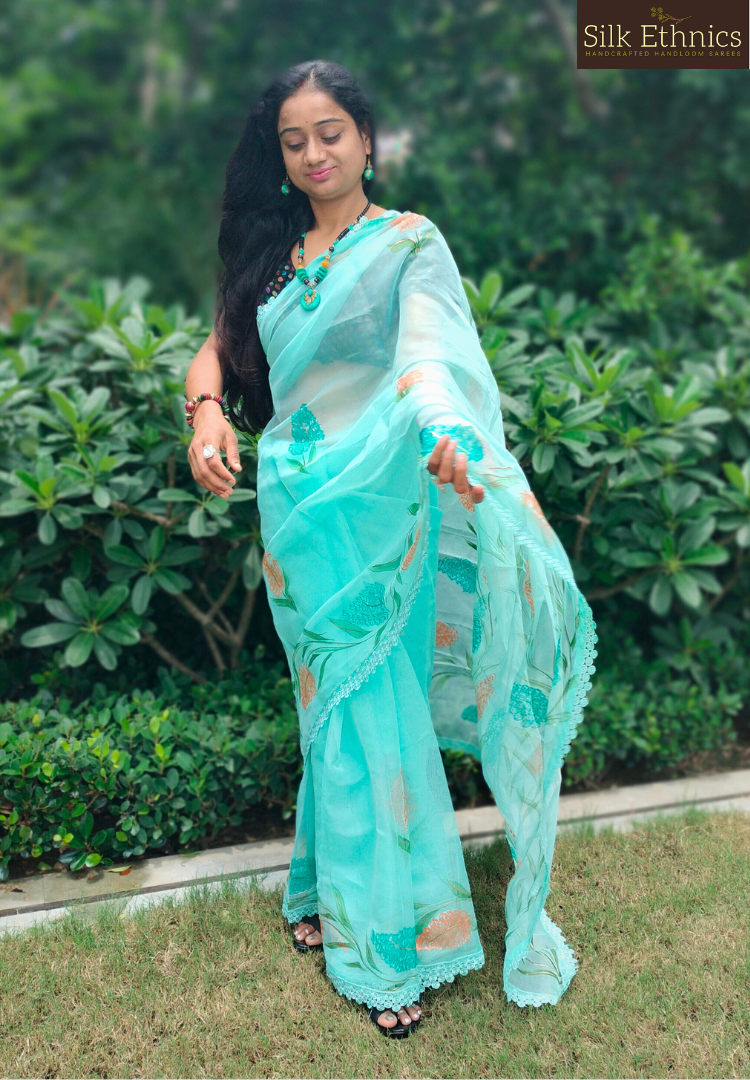 Handpainted turquoise Blue soft organza saree