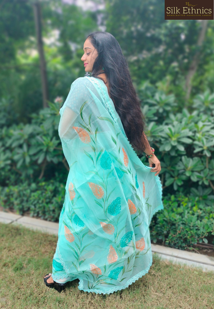 Handpainted turquoise Blue soft organza saree