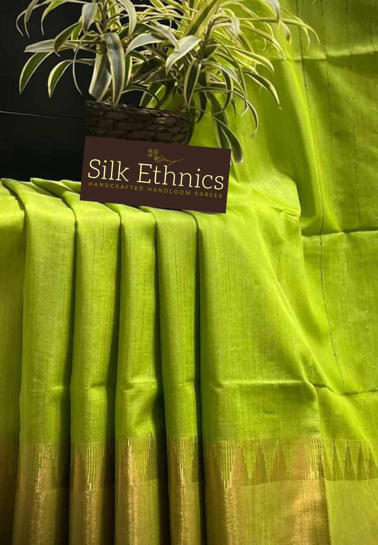 Temple border green raw silk saree