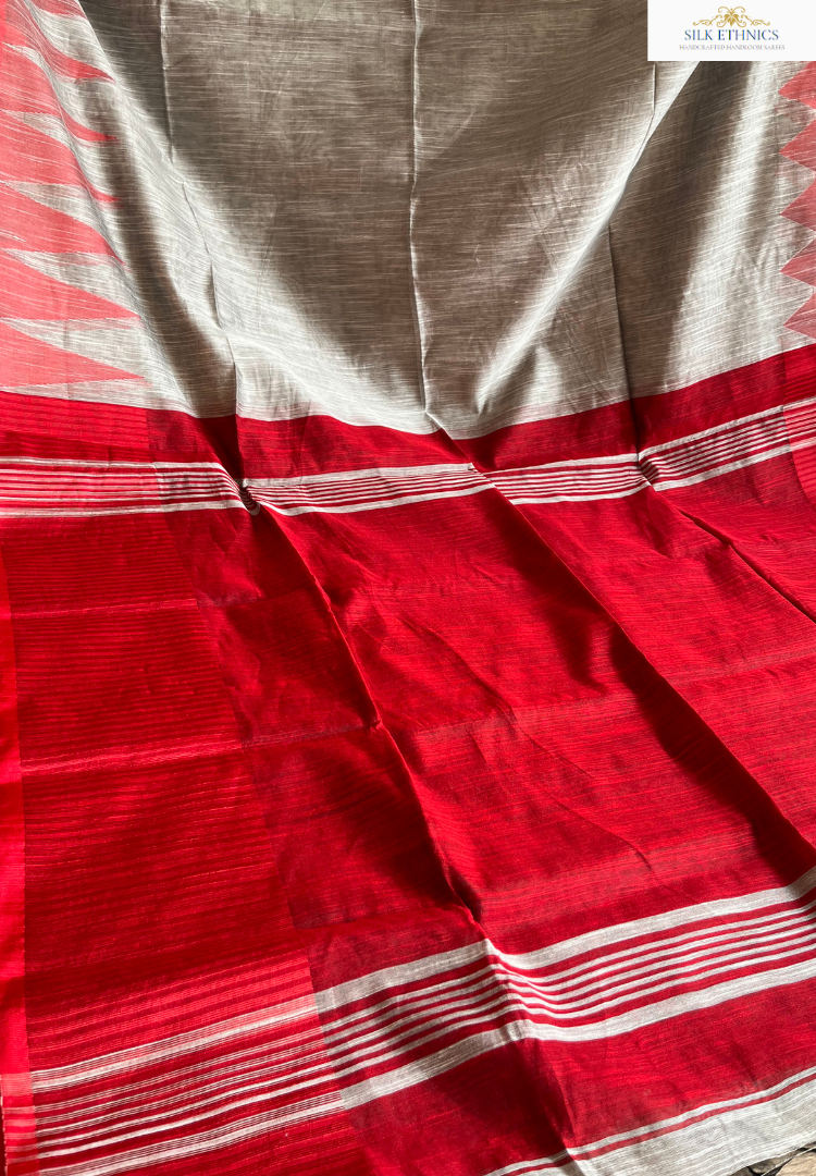 Silver grey and vibrant red temple border saree