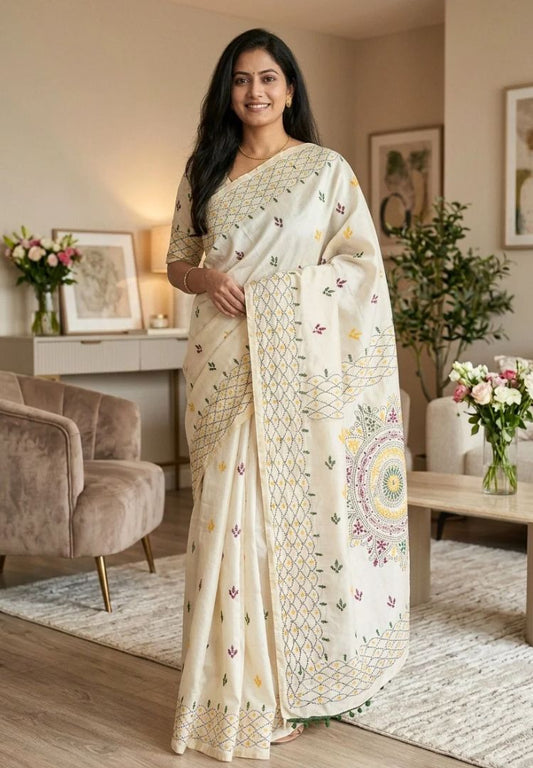 Woman wearing the Ivory and Green Gulbahar hand embroidered kantha and phulkari Chanderi saree - Silk Ethnics