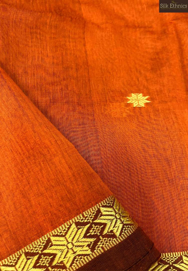 Vibrant orange Maheswari silkcotton saree