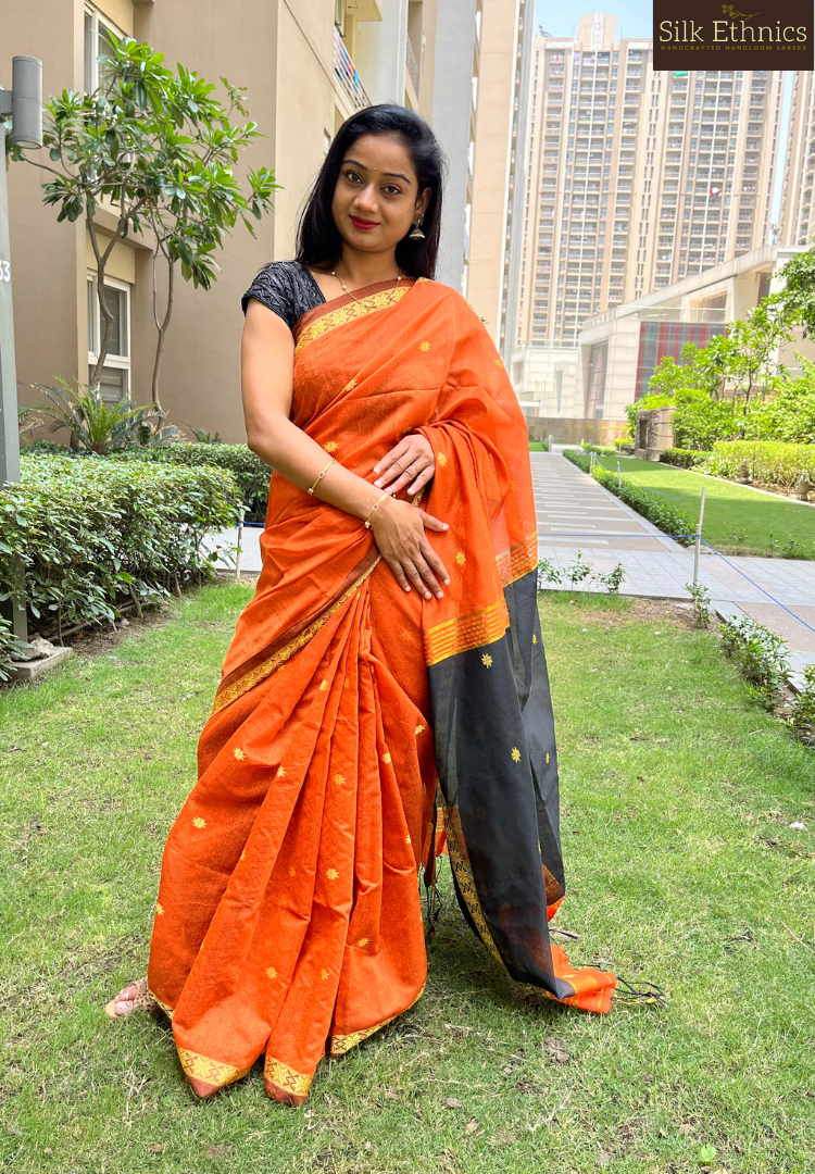 Vibrant orange Maheswari silkcotton saree