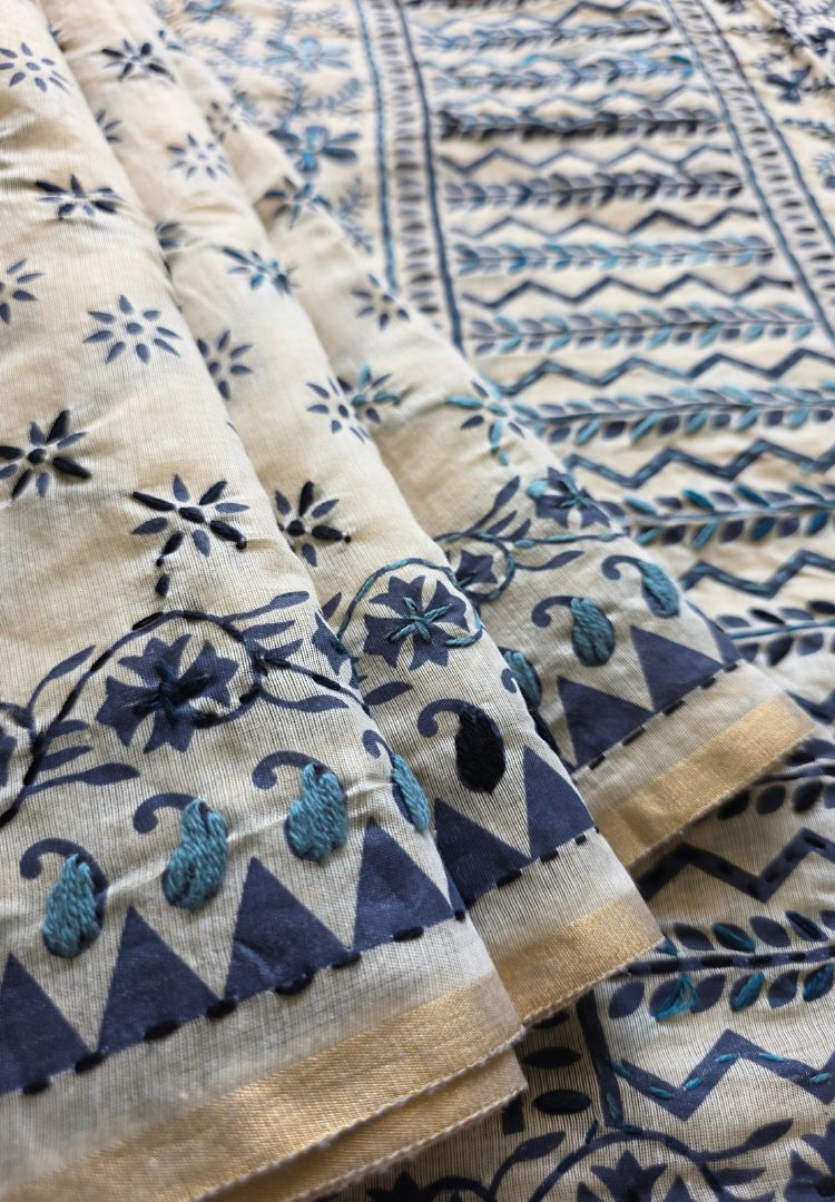Indigo hand embroidered motifs and zigzag border on ivory Gulbahar Chanderi saree