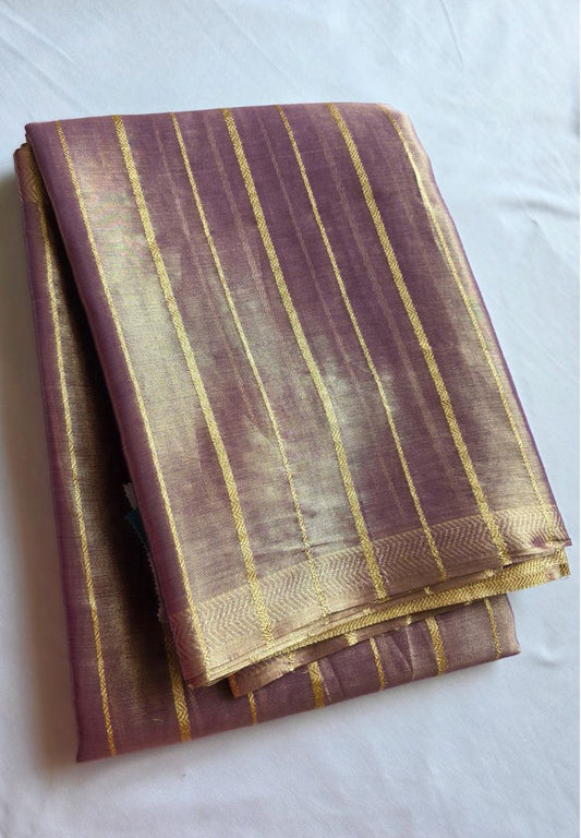 Folded lavender katan tissue saree with gold zari stripes