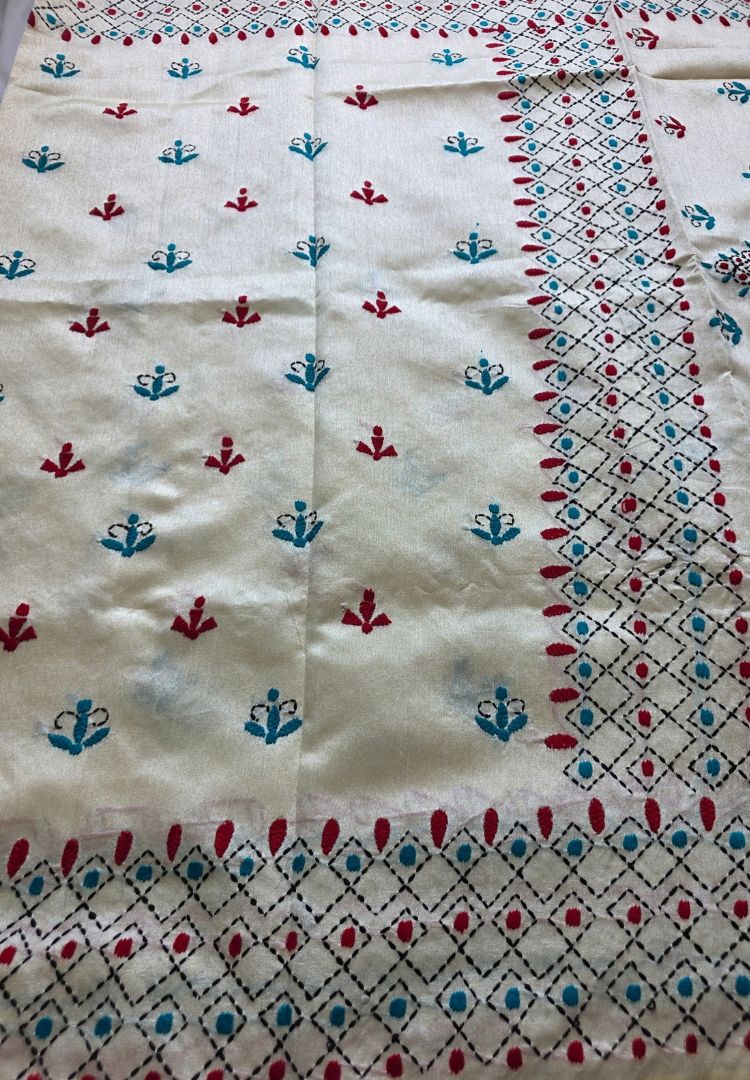 Hand embroidered red, teal and pink motifs on ivory Chanderi silk-cotton, Gulbahar collection