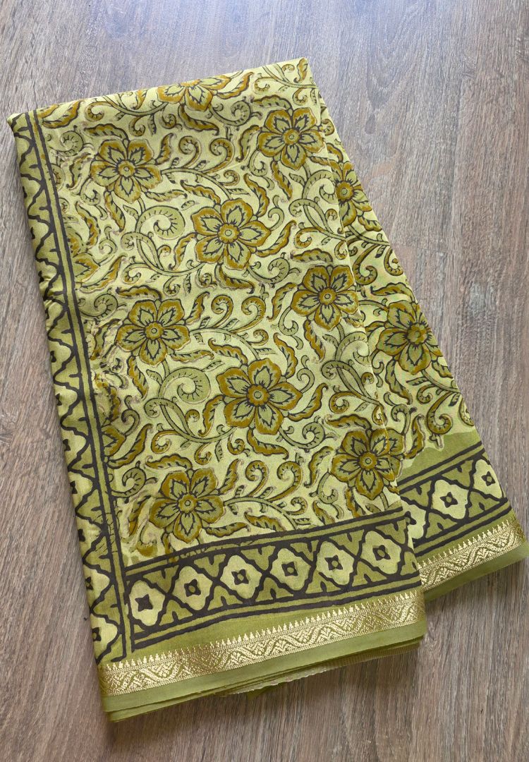 Olive green Ajrakh hand blockprinted Maheswari silk saree