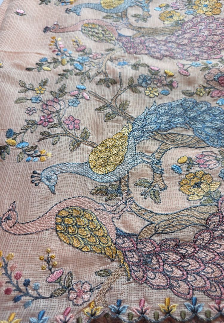 Close-up of colourful peacock embroidery on soft Kota, Gulbahar collection