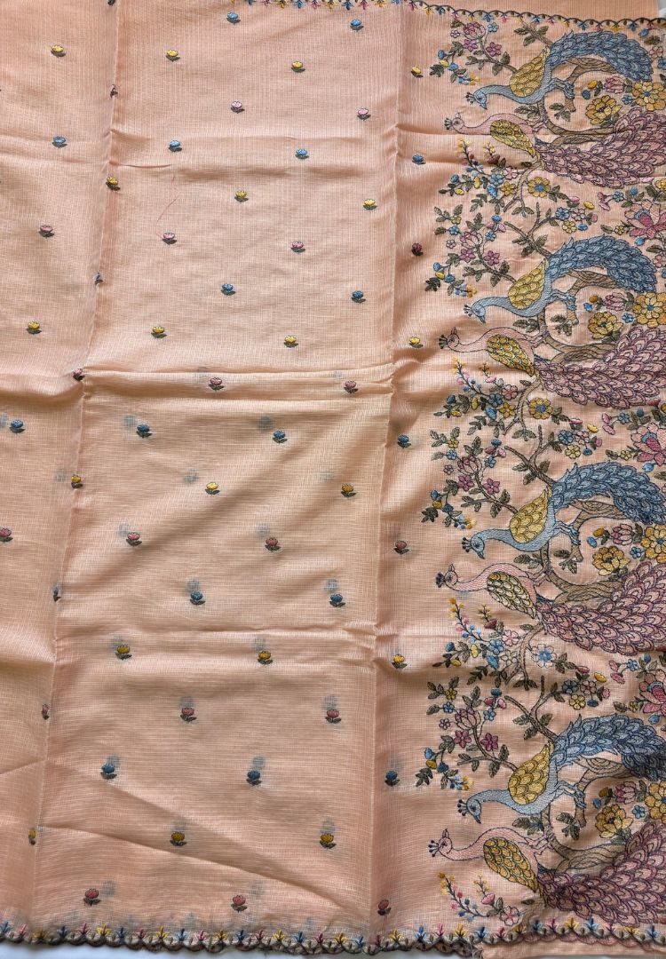 Fine airy weave of the pastel peach soft Kota saree