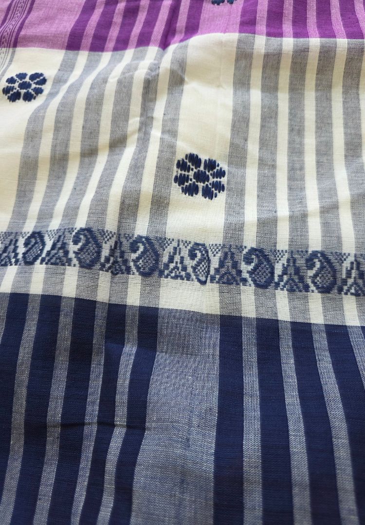 Fabric texture of a pure cotton purple and grey Ikkat Dhaniakhali saree