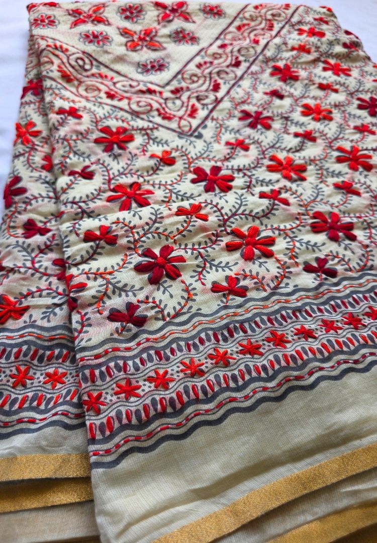 Red hand embroidered motifs and border on the Ivory and Red Gulbahar Chanderi saree