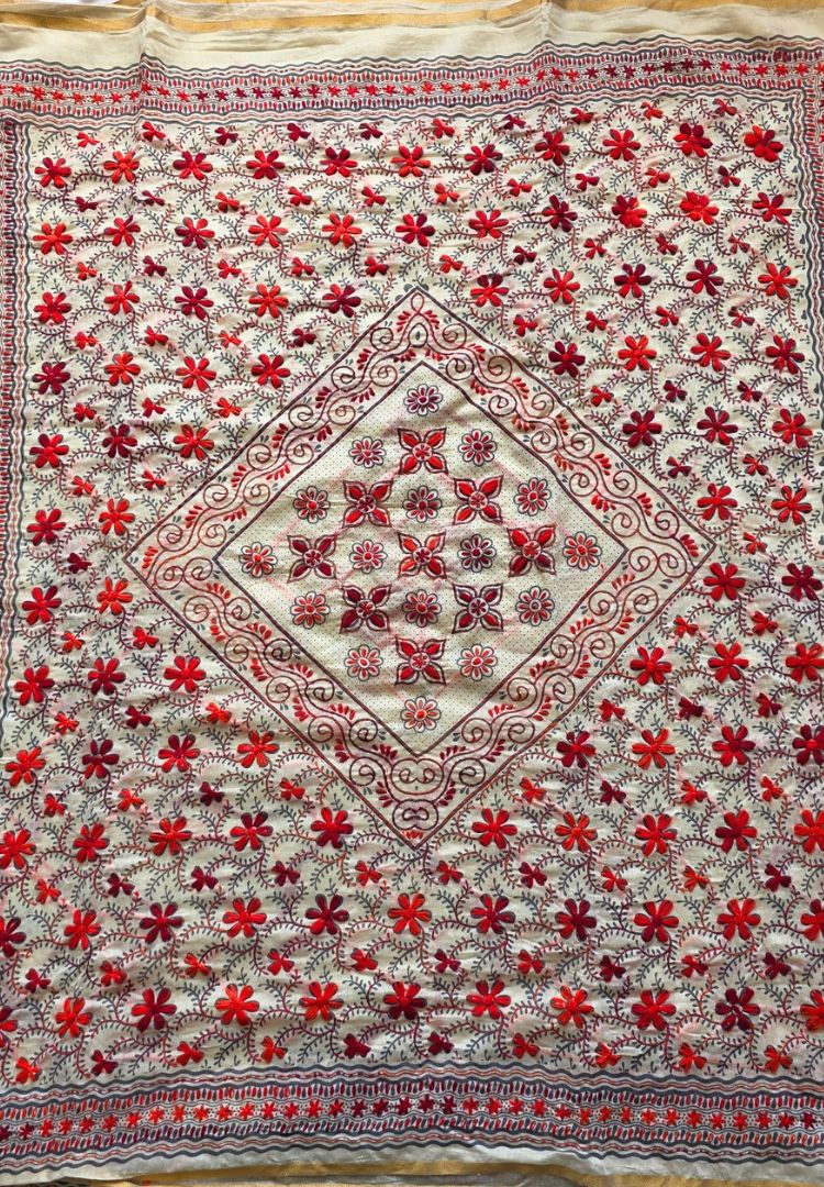 Densely hand embroidered red pallu of the Gulbahar Chanderi saree