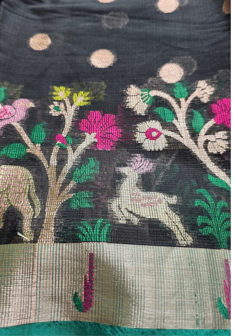 Pink and green flowering tree with woven deer on black Kota silk