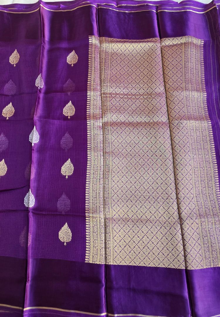 Purple Kota silk body with gold zari brocade butis and pallu