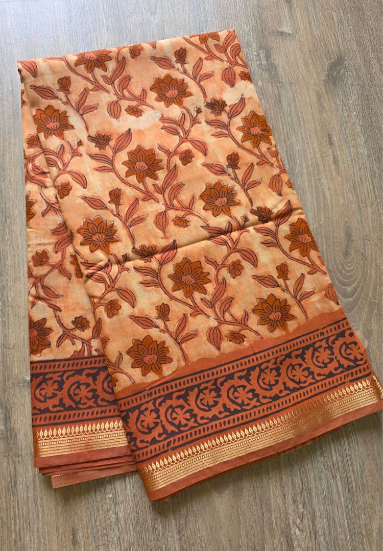 Rust Orange Ajrakh hand blockprinted Maheswari silk saree