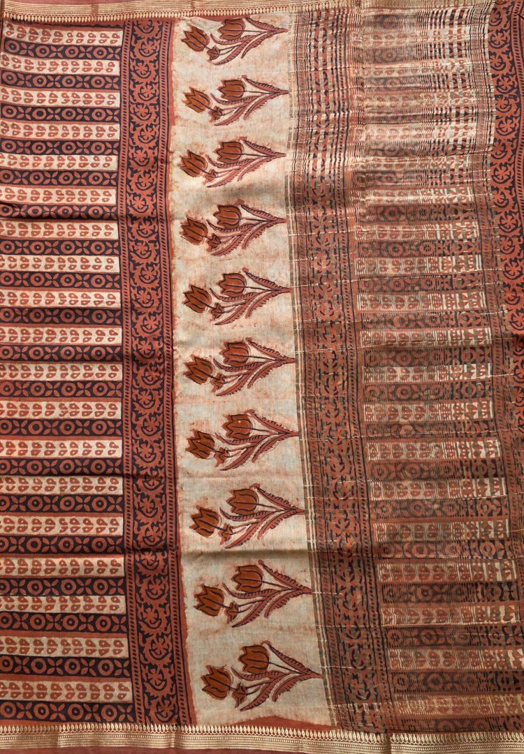 Rust Orange Ajrakh hand blockprinted Maheswari silk saree
