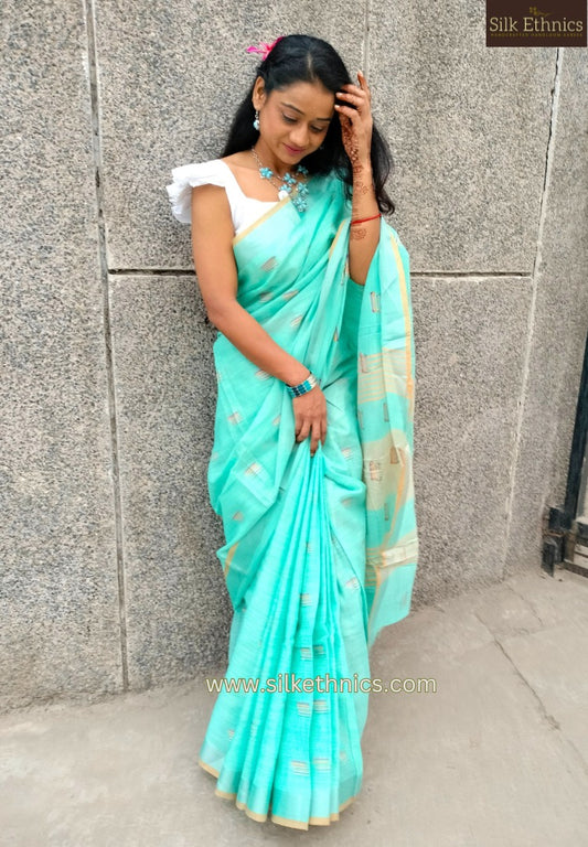 Turqoise green slub linen saree