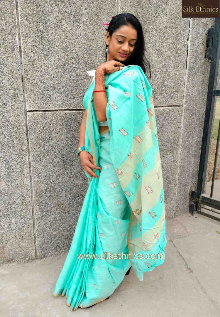 Turqoise green slub linen saree