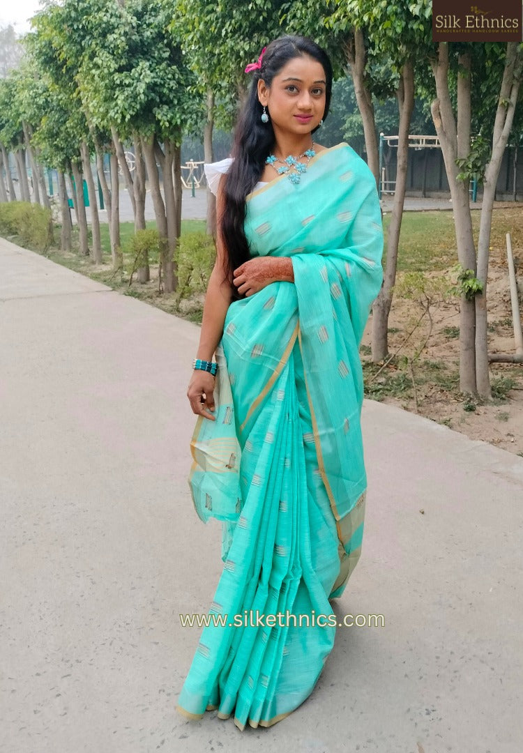 Turqoise green slub linen saree