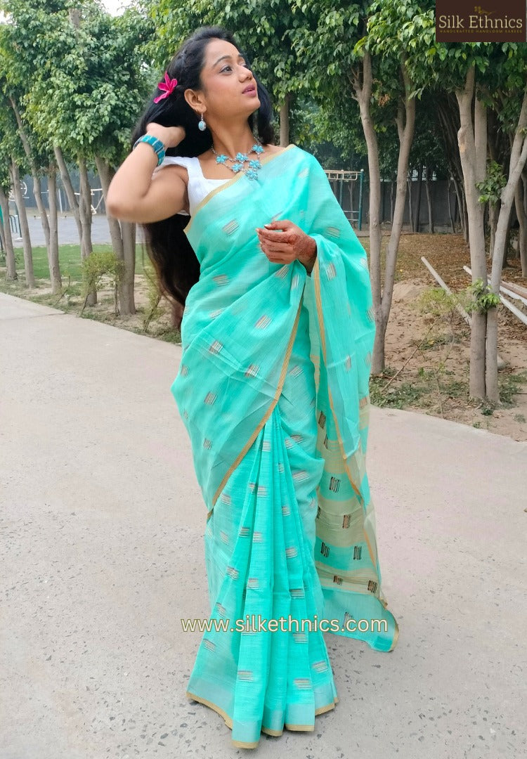 Turqoise green slub linen saree