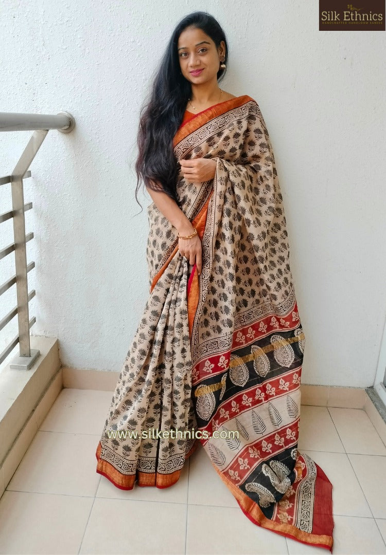 Beige and red Maheswari silk saree