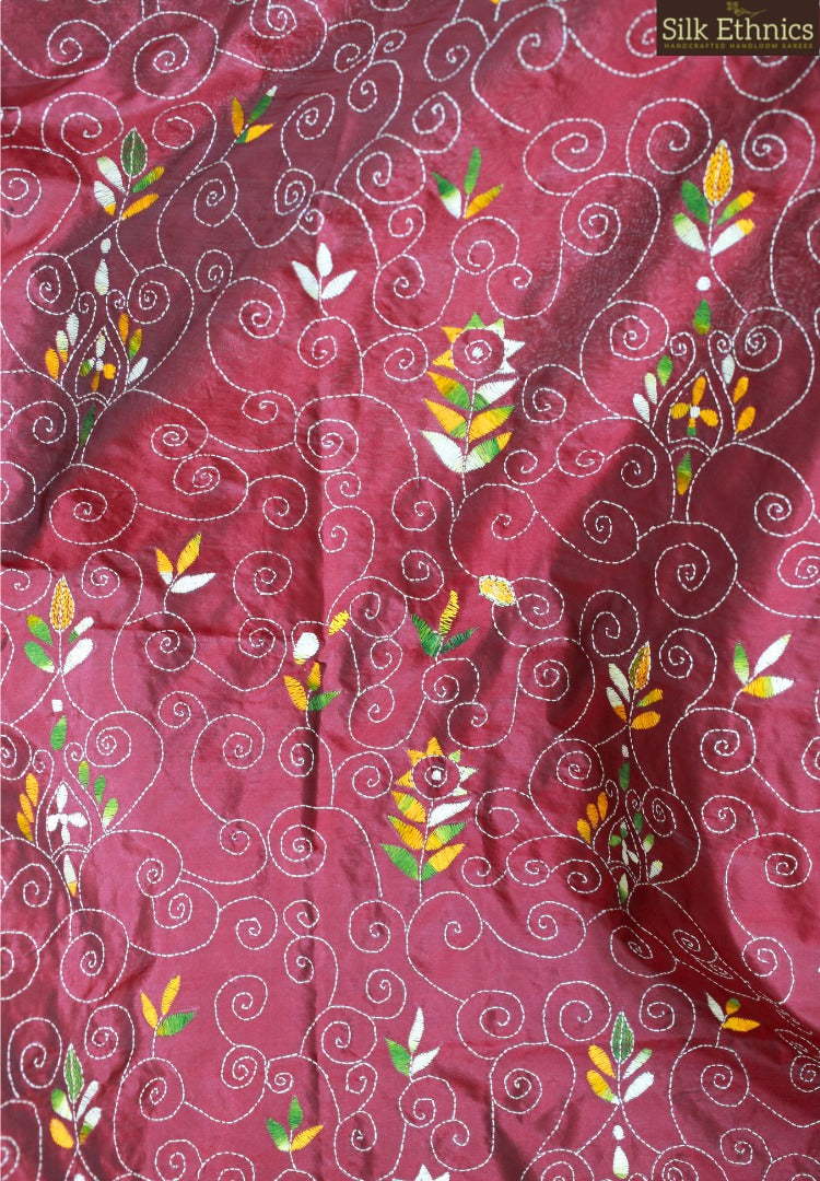 Maroon hand embroidered silk saree