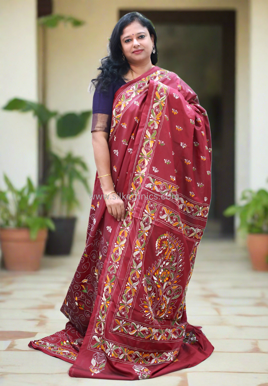 Maroon hand embroidered silk saree