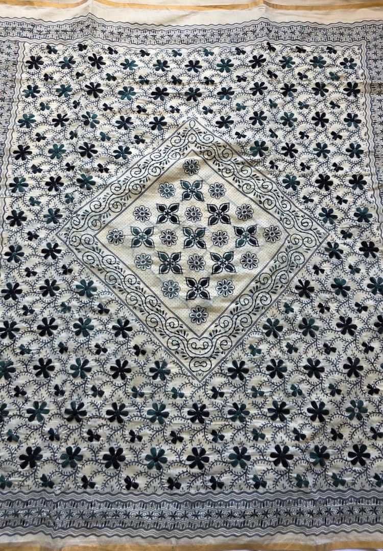 Pallu of the Ivory and Black Gulbahar Chanderi saree with black hand embroidered diamond motif