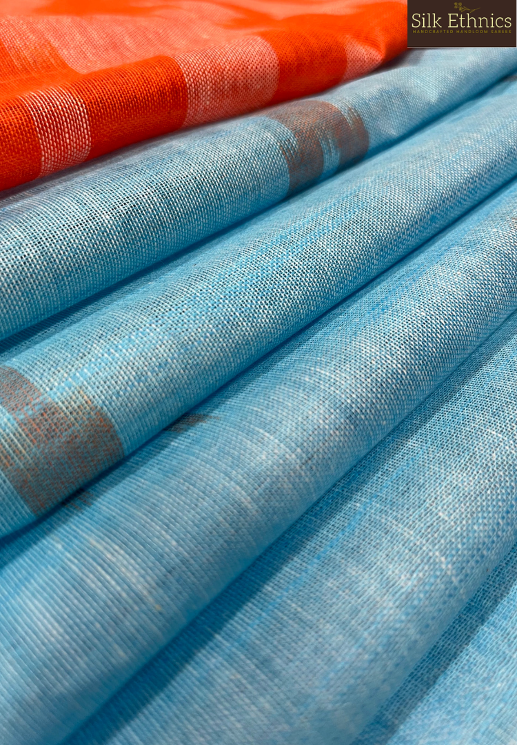 Sky blue and orange linen ikkat weaving saree