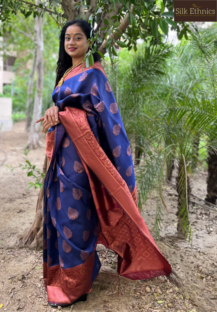 Peacock blue silver zari woven banarasi saree