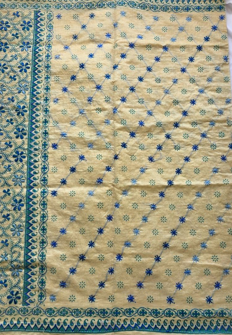 Close-up of teal blue hand embroidery on Gulbahar Chanderi silk-cotton
