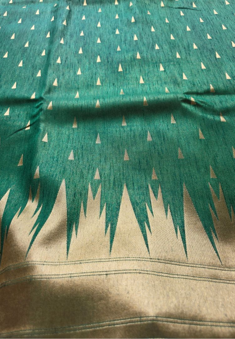 Close-up of zari butis and temple border on forest green Banarasi silk