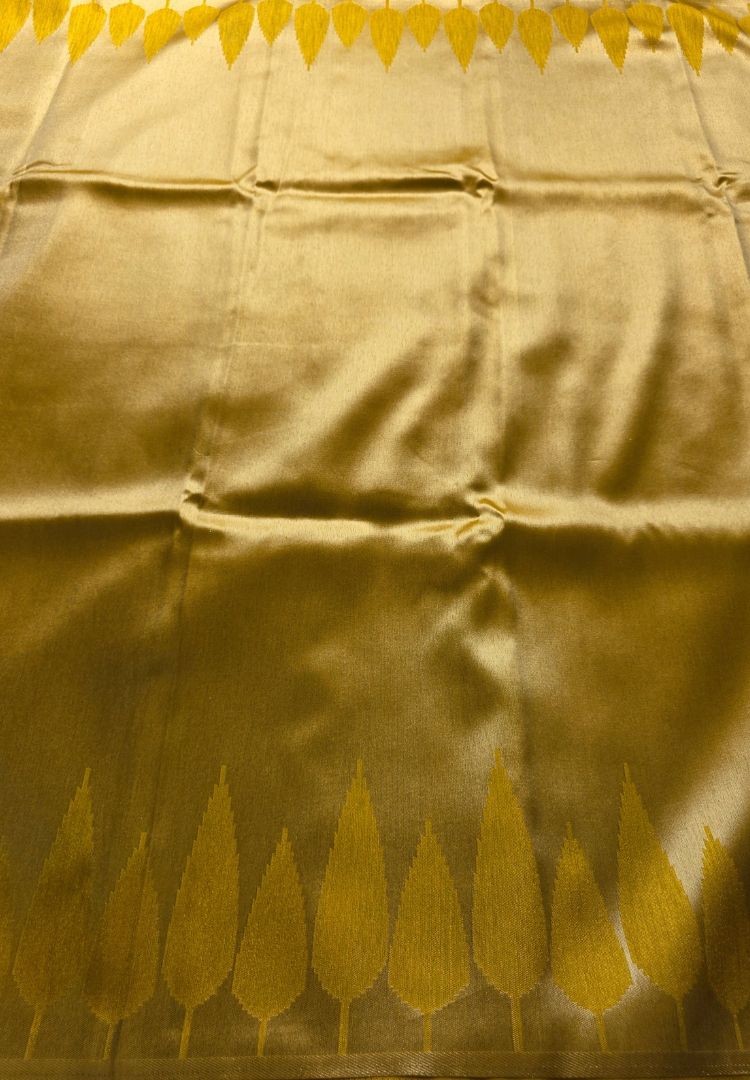 Folded gold Banarasi soft silk saree with woven zari temple border