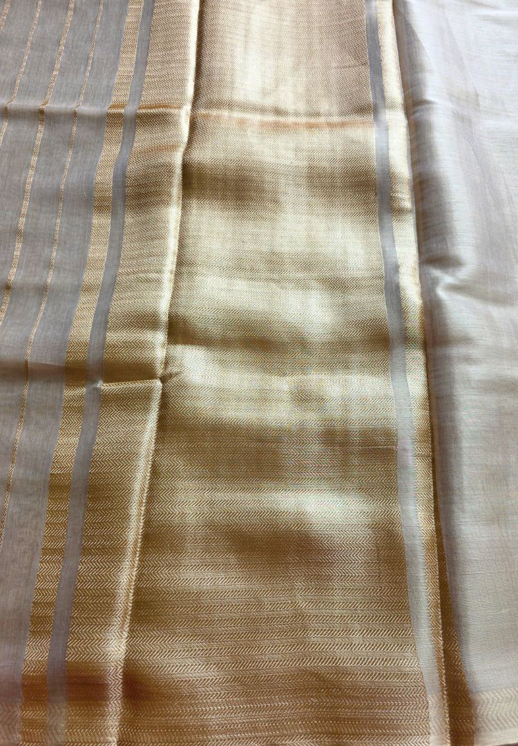 Lustrous ivory gold tissue body with woven zari stripes