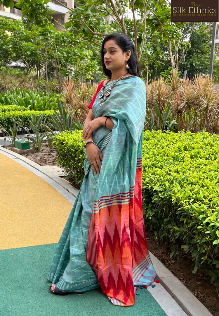 Pine green and red linen ikkat weaving saree