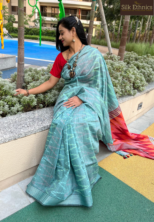 Pine green and red linen ikkat weaving saree