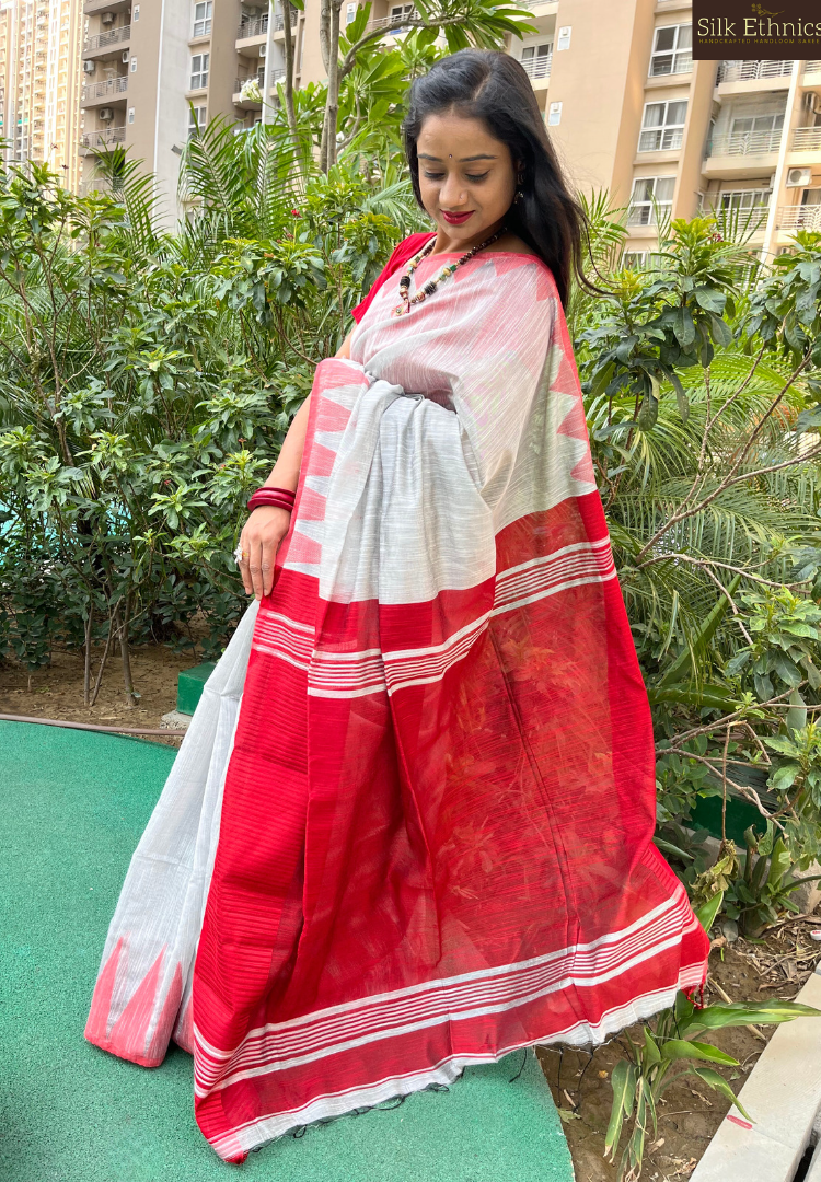 Silver grey and vibrant red temple border saree