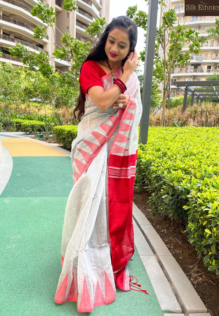 Silver grey and vibrant red temple border saree