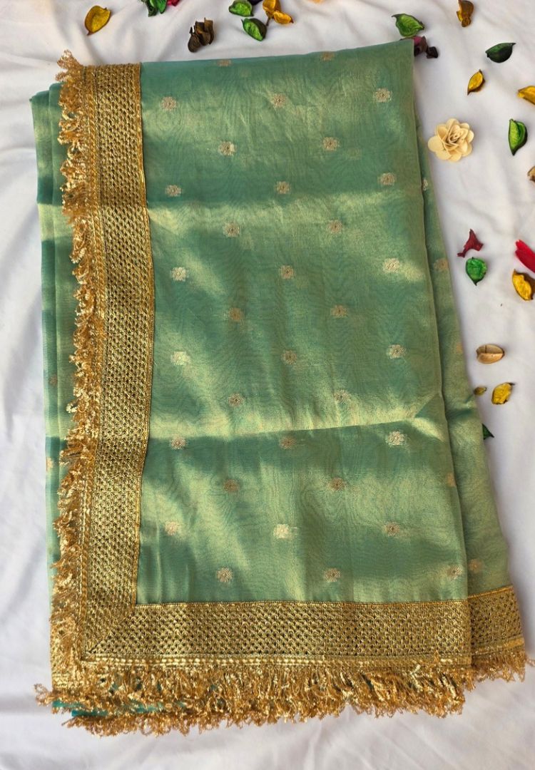 Folded Mint Green Banarasi tissue saree with gold lace border