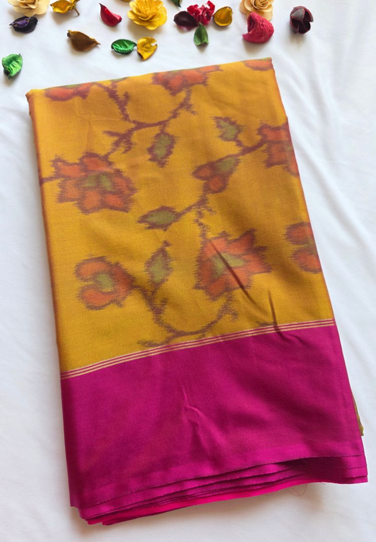Folded mustard gold semi katan silk saree with purple Ikkat floral jaal and magenta border