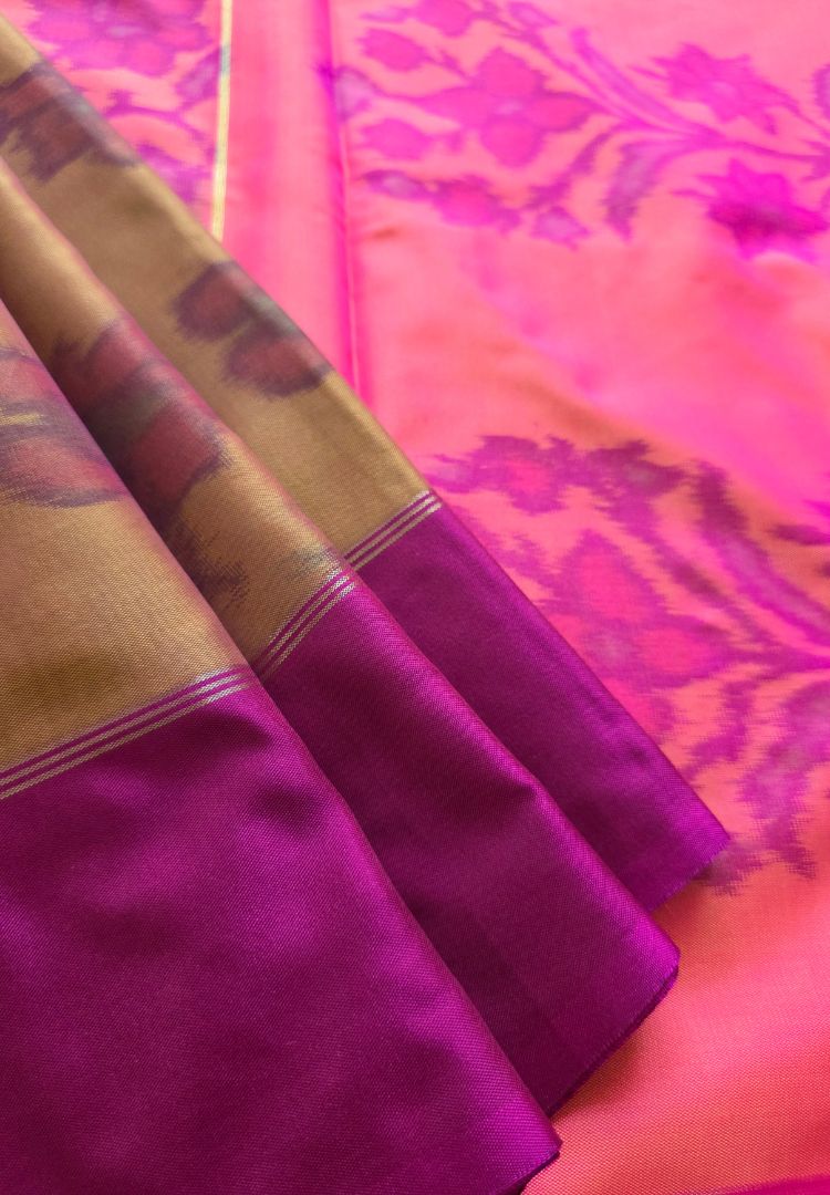 Rani pink pallu and magenta border of a mustard Ikkat semi katan silk saree