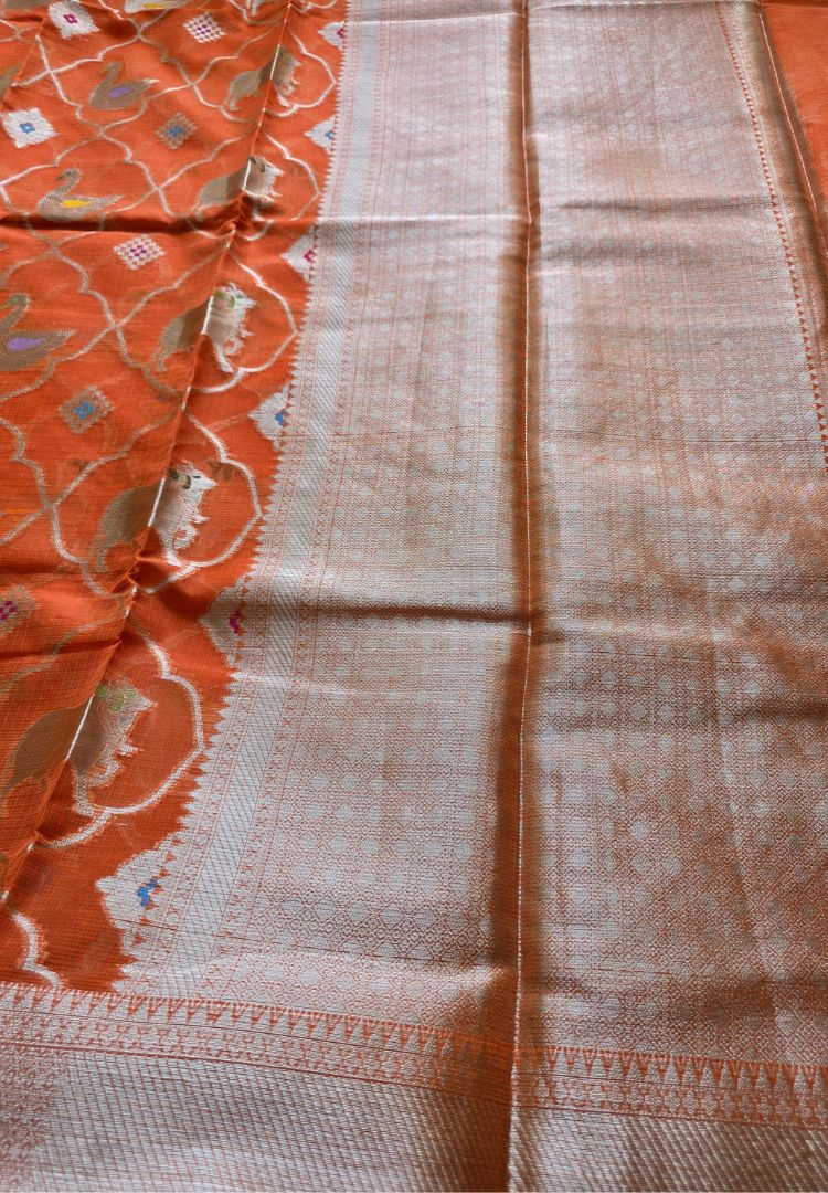 Zari woven pallu of the Vibrant Orange Pichwai Kota silk saree