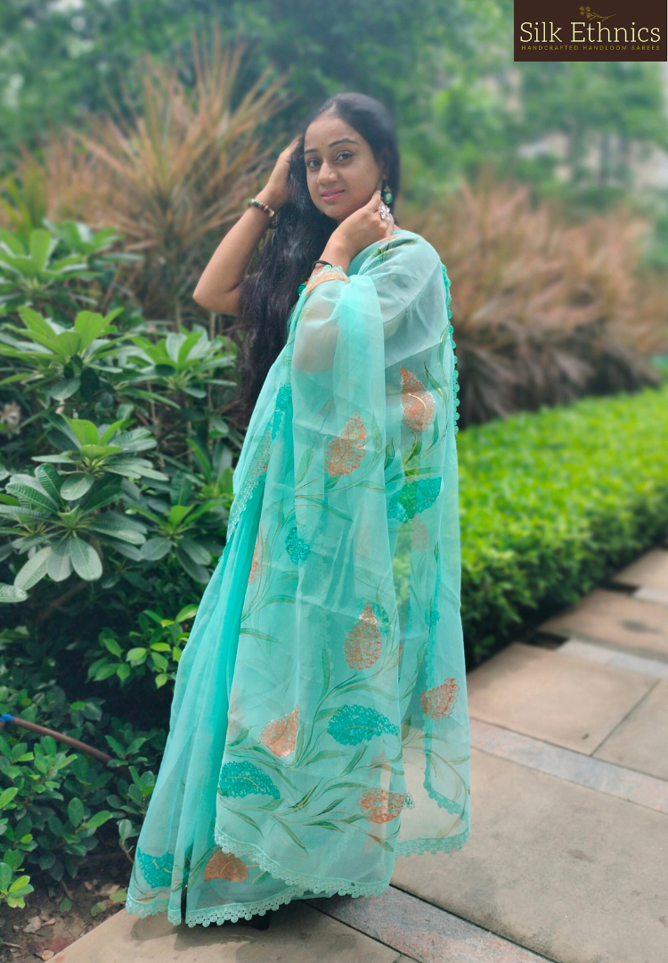 Handpainted turquoise Blue soft organza  saree