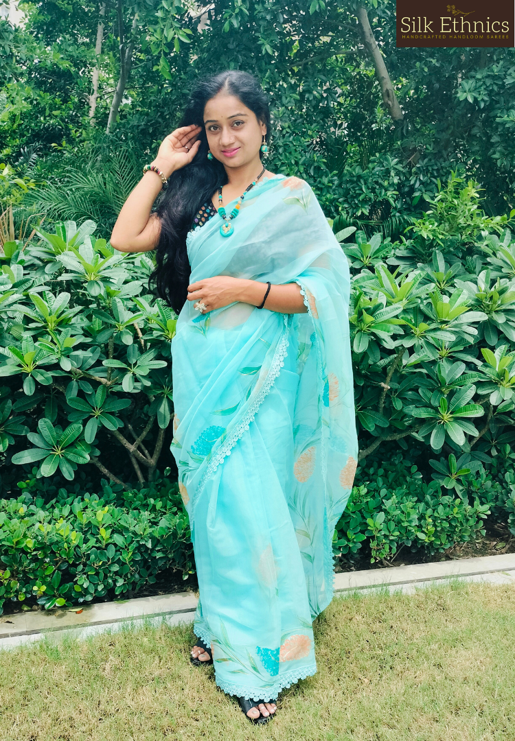 Handpainted turquoise Blue soft organza  saree