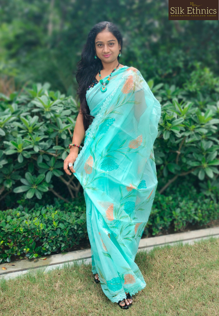 Handpainted turquoise Blue soft organza  saree