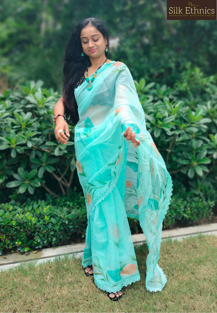 Handpainted turquoise Blue soft organza  saree