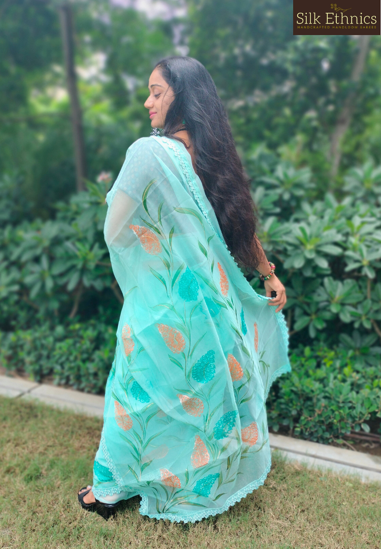 Handpainted turquoise Blue soft organza  saree